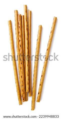 Pretzel sticks close-up on a white background. Top view Royalty-Free Stock Photo #2239948833
