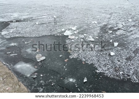 Frosted pond next to Brasserie Mariadal building in Zaventem, Belgium Royalty-Free Stock Photo #2239968453