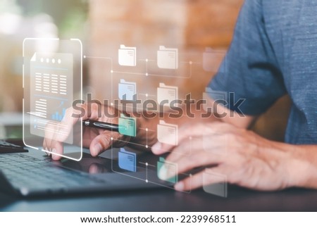 Businessman using laptop to access documents online,Document Management System,Manage financial and marketing documents Annual budget account updates company growth information,