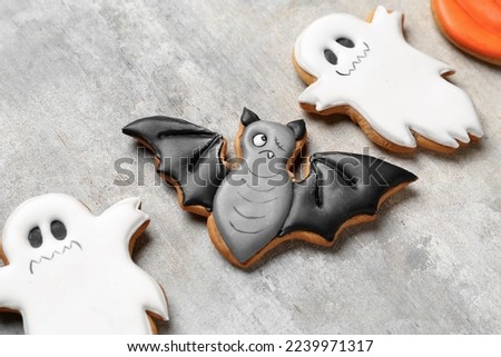 Halloween cookies on grunge background, closeup