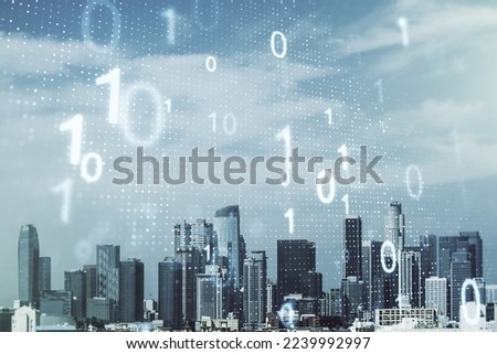 Double exposure of abstract virtual binary code hologram on Los Angeles city skyscrapers background. Database and programming concept