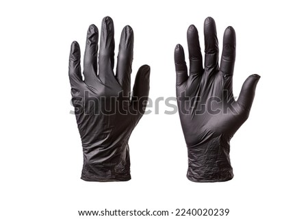 Black gloves worn on the hands, the outer and inner sides of the hands, isolated on white background, closeup
