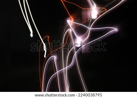 light painting with a street light staying inside a car
