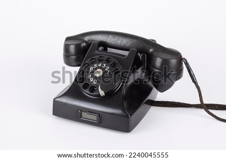 Antique black phone macro detail shot abstract pastel background image home phone made of composition on white background buying. 