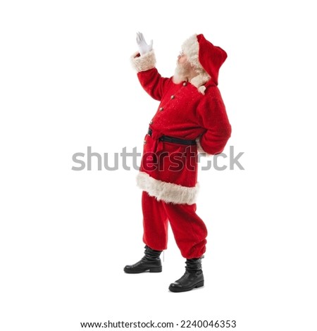 Santa Claus showing copy space with hand isolated on white background