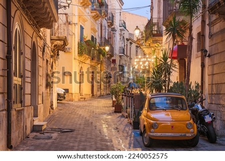 Syracuse, Italy cityscape and street scene at twilight. Royalty-Free Stock Photo #2240052575