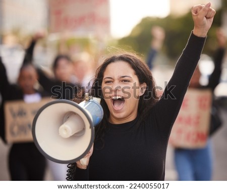 Megaphone, woman and people for gender equality, human rights or justice with freedom of speech in city street. Vote, protest and Mexico girl in crowd with voice for politics, angry broadcast or news Royalty-Free Stock Photo #2240055017