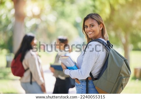 Education, university and woman student with learning, scholarship and college campus, book for reading and study in academic portrait. Young girl smile, backpack and learn with knowledge in Boston. Royalty-Free Stock Photo #2240055315