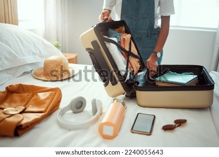 Suitcase, woman and packing clothes, bag and luggage for travel, vacation and international journey, summer adventure and tourism. Closeup female tourist, hotel room and holiday clothing in baggage Royalty-Free Stock Photo #2240055643