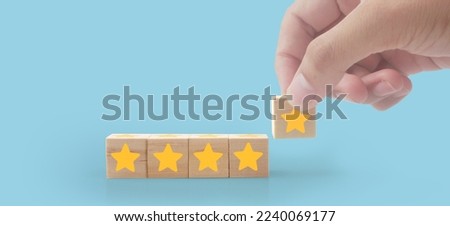Wooden cubes in hand with copy space for input wording and infographic