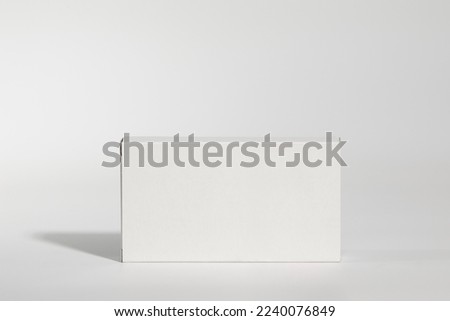 Mockup of a white box of parapharmacy product, standing, includes tracing Royalty-Free Stock Photo #2240076849