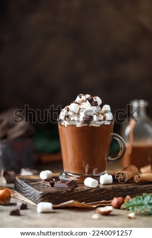 Hot chocolate with marshmallows on dark background. Hot beverage with cocoa 
