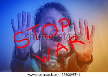 Upset little girl protesting war: Stop War. Conceptual image: lost childhood, russia's aggression and war against the Ukrainian people, genocide of the civilian population of Ukraine.
