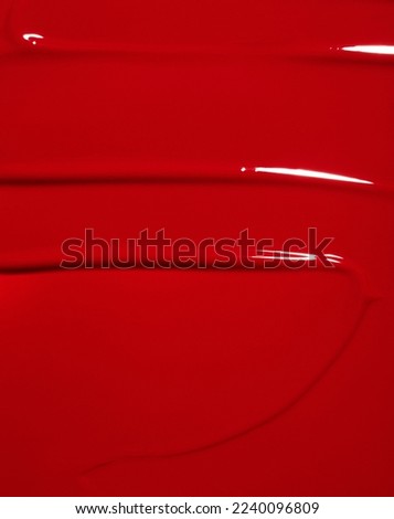 red swatch of lipgloss, bright color cosmetic product stroke, acryl gouache oil paint texture, cosmetic or beauty product texture	 Royalty-Free Stock Photo #2240096809