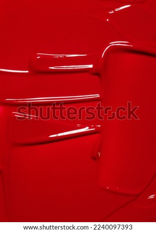 red swatch of lipgloss, bright color cosmetic product stroke, acryl gouache oil paint texture, cosmetic or beauty product texture	 Royalty-Free Stock Photo #2240097393