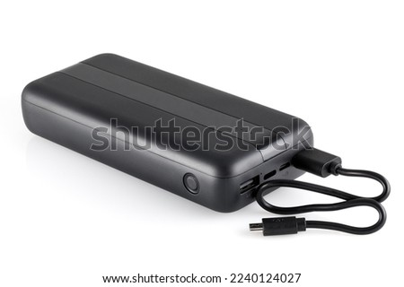 Additional self-contained external battery for charging mobile and other device. Power bank isolated on white background. Stylish charger (rechargeable battery) . Full depth of field. Royalty-Free Stock Photo #2240124027