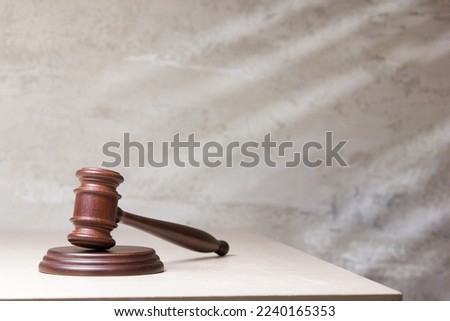 Law and justice concept. Mallet gavel of the judge, scales of justice, books. Copy space for text	