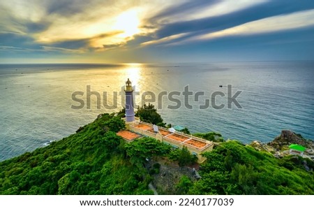 Lighthouse at sea dawn landscape in the Phu Yen, Vietnam. Beautiful sunrise over lighthouse. The most visited tourist location in the Vietnam