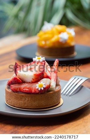 Petite Gateau French Dessert and Slice Celebration Cakes Royalty-Free Stock Photo #2240178717