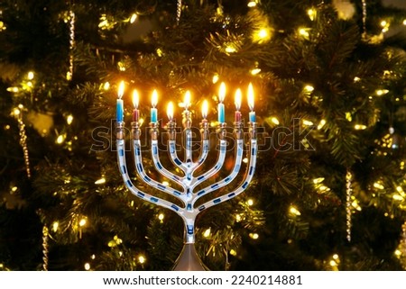 During Hanukkah, a nine candle menorah is lit.
