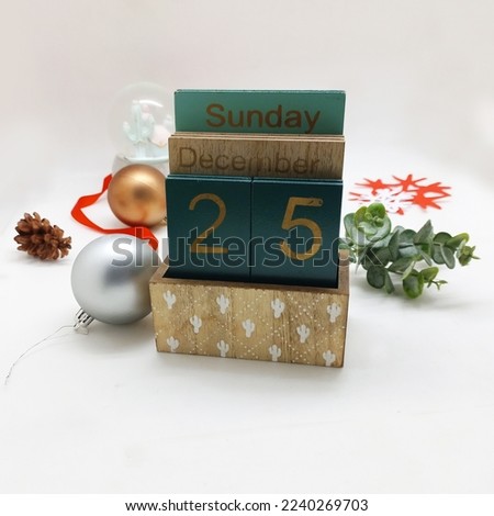 retro calendar with christmas ornament on white background