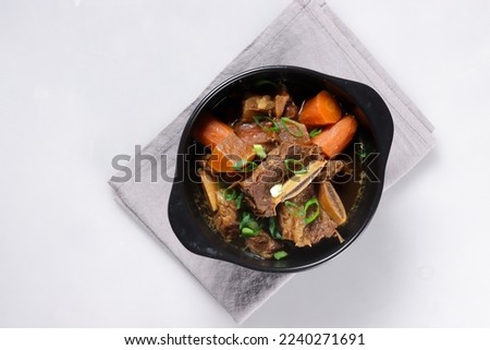 Galbijjim or KalbijJim is Korean Traditional Braised Beef Short Ribs Dish in a Rich Sauce. Royalty-Free Stock Photo #2240271691
