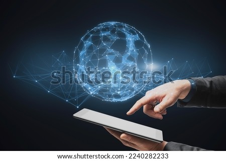  hand pointing at cellphone with glowing polygonal sphere on blurry dark background. Futuristic technology wireframe mesh polygonal element. Connection Structure. Digital Data Visualization. 