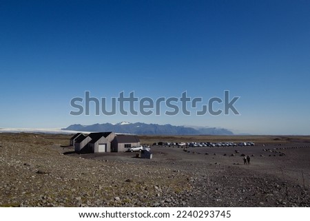 Dreki hut and camping space landscape photo. Beautiful nature scenery photography with blue sky on background. Idyllic scene. High quality picture for wallpaper, travel blog, magazine, article