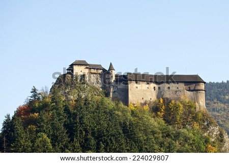 A view of famous Orava Castle in autumn. This castle is situated on a high rock above the river Orava, located in Oravsky Podzamok town, Orava region, northern Slovakia.