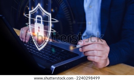 Computer network protection, secure and safe your data concept, businessman holding shield protection icon, Security shield Lock Security Businessman Protect Concept