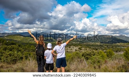 Family traveling in countryside in France ( Cevennes,  Occitanie) Royalty-Free Stock Photo #2240309845