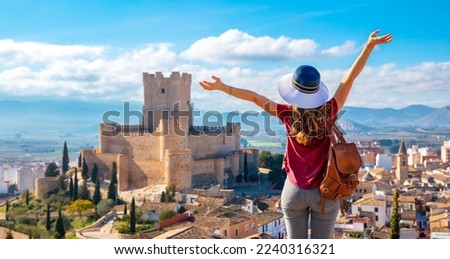 Atalya,Villena Castle in Costa Blanca Alicante Spain- woman tourist enjoying beautiful panoramic view Royalty-Free Stock Photo #2240316321