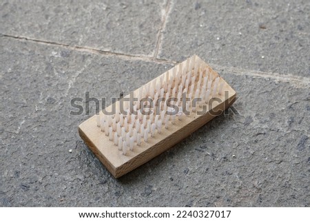 close up of a simple clothes brusher