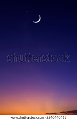 Crescent Moon and Star on colorful Dusk Sky in Vertical frame, Beautiful Twilight background with free space for text Ramadan, Eid Al Adha, Mubarak, Eid Al Fitr, Muharram