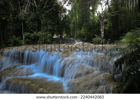 beautifull waterfall use low speed shutter teak a photo