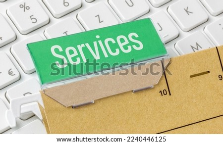 A brown file folder labeled Services