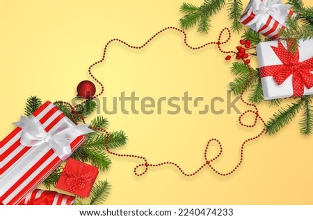 Christmas composition with branches, decorations on desk