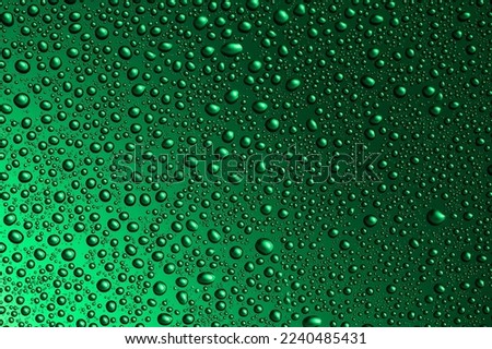 Green wet background. all in drops and splashes.