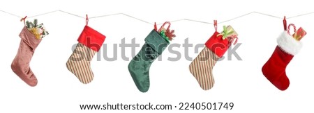 Collage of hanging Christmas socks with gifts on white background