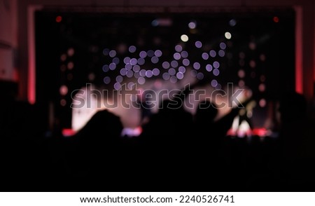 Texture blur and defocus, background for design. Stage light at a concert show in theater.