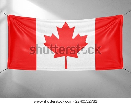Canada national flag cloth fabric waving on beautiful grey sky.