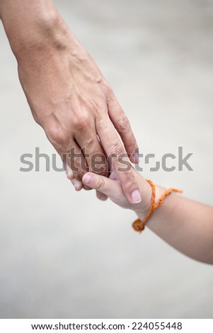 Hand mother and daughter