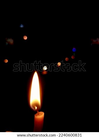 Candle in a dark background