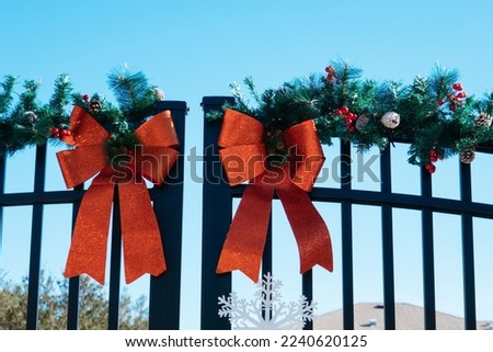 Christmas decoration in front of a community gate