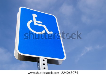 The blank handicap parking street sign.