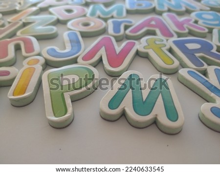 colorful shapes with alphabet letters