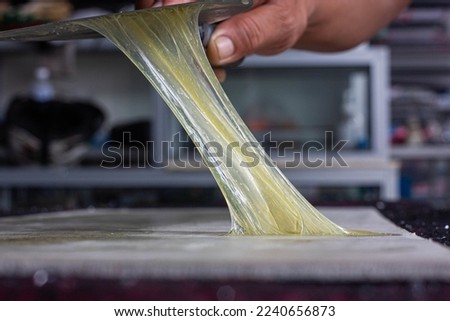 Closeup rubber adhesive that is used in general and in factories. Royalty-Free Stock Photo #2240656873