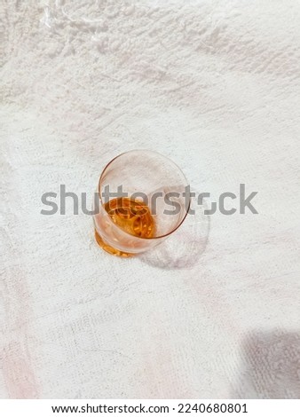 orange chrystal glass on the white background
