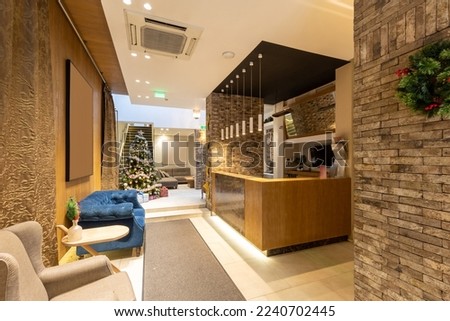 Christmas decorated hotel lobby with reception desk