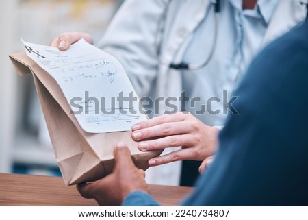 Pharmacy, prescription medication and doctor hands with retail patient, shopping or healthcare product. Closeup, nurse or pharmacist with customer for health note, wellness pills and brown paper bag Royalty-Free Stock Photo #2240734807